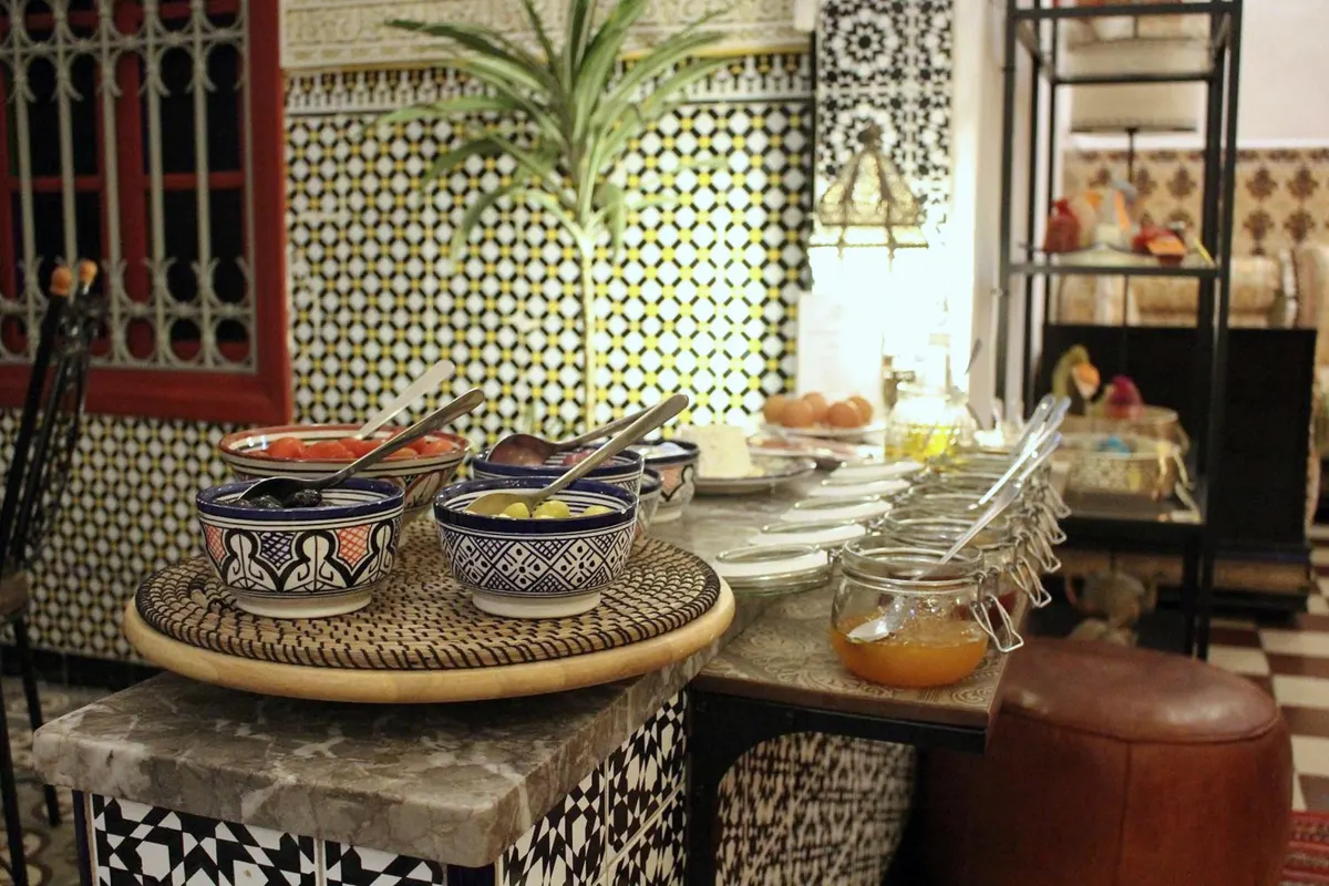 The breakfast buffet: Fès pottery bowls, jams, a zellige counter