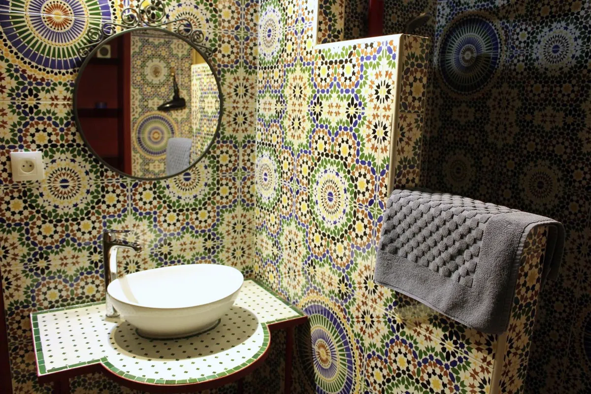 Chellah bathroom in multicoloured zellige with vessel basin